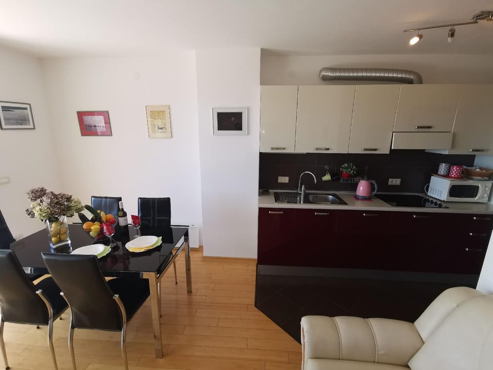 Living area. Living + dining area + kitchen