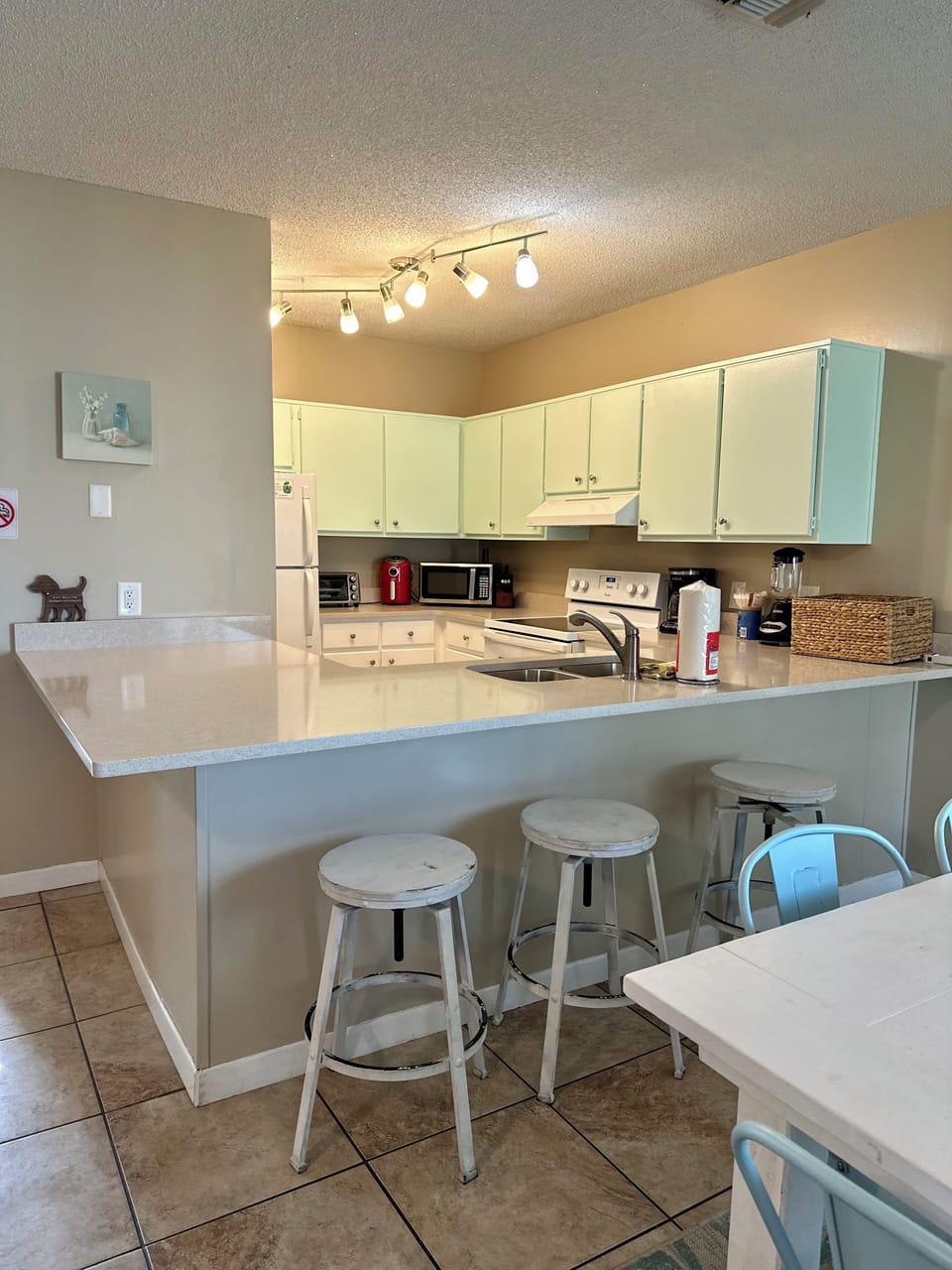 Dining at bar in kitchen
