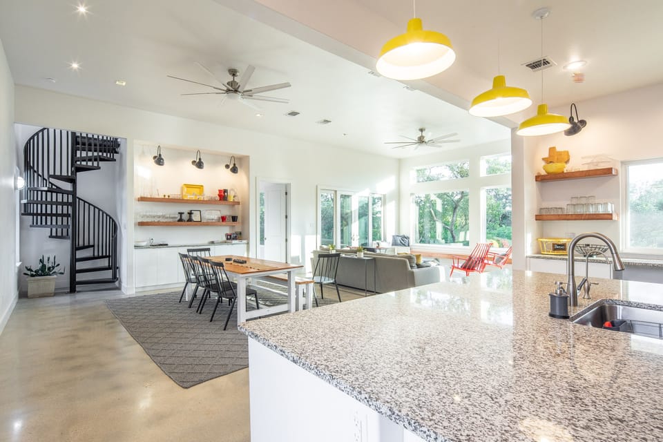 Open kitchen, dining, and living space