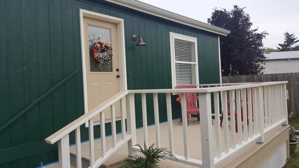 Front Porch with a couple chairs to view the neighborhood 
