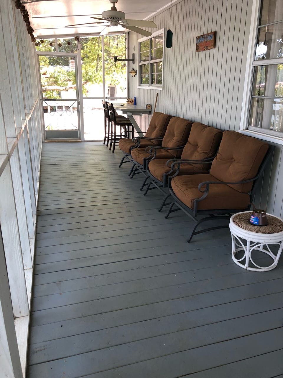 Plenty of seating on the screened porch