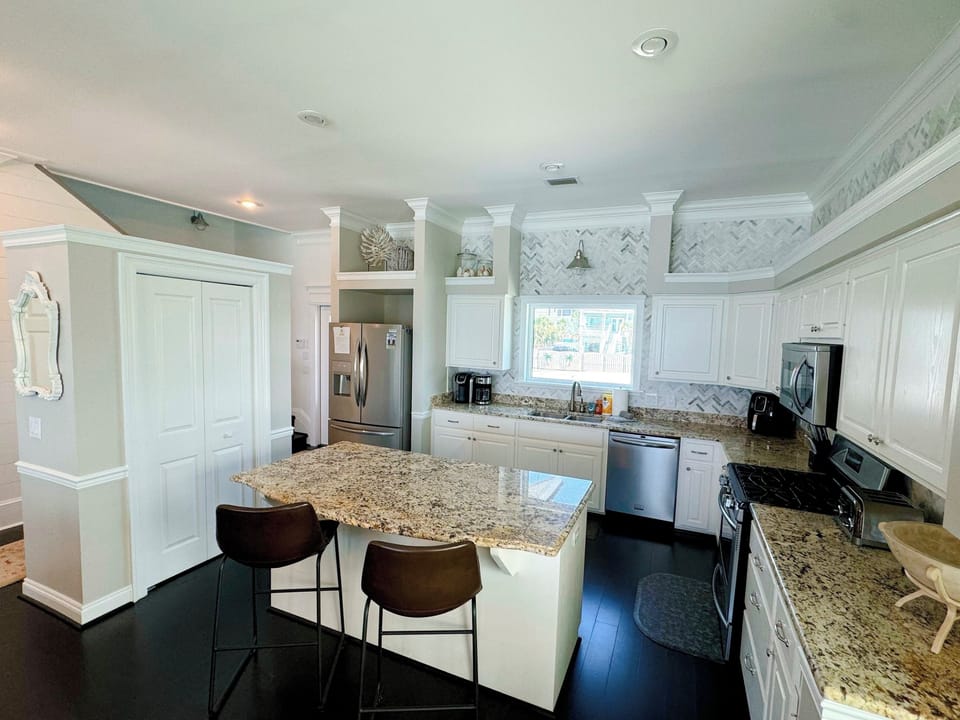 Kitchen with Wine Cooler and Gas Stove
(Keurig & Coffee Maker)