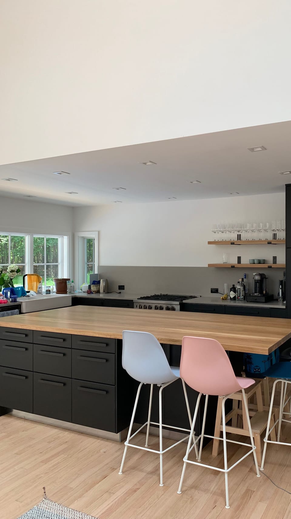 Another view of the kitchen and window which looks out at the pool & deck 