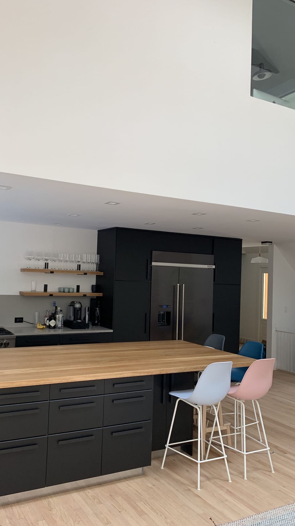 Modern kitchen with huge island, farmhouse sink, high quality appliances