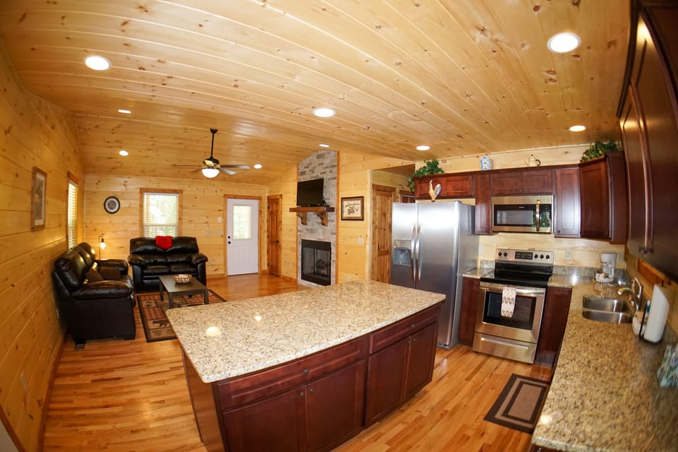 Kitchen and Living Area - Full kitchen looking into living area