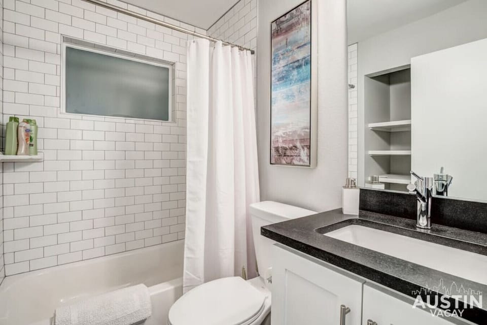 Full bathroom with the essentials plus shampoo, conditioner, and body wash