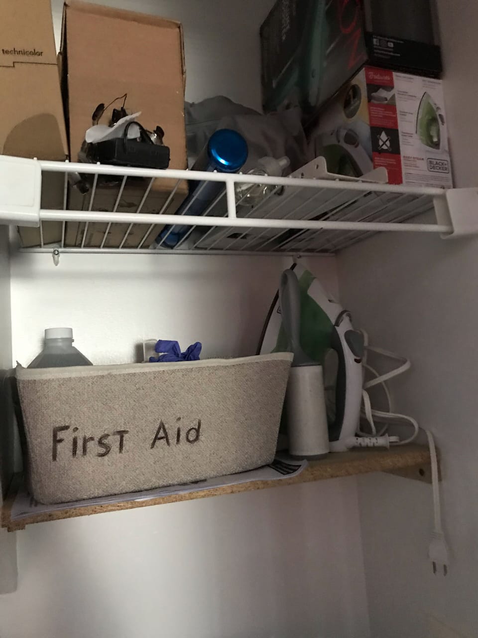 First aid, hair dryer, iron, iron table 