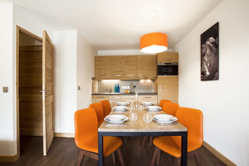 Loads of room at the dining table and the open-concept is always nice for the cook.