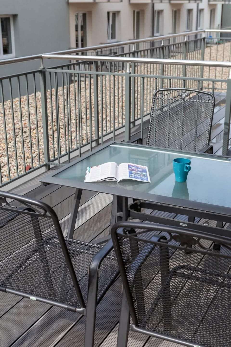 Balcony with garden furniture.