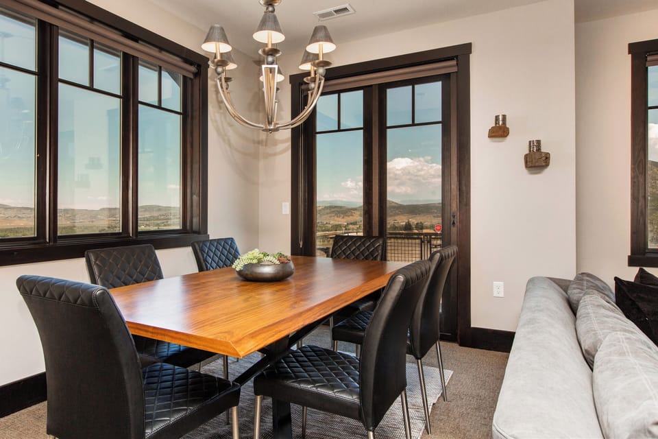 Dining Table with Seating for Six and Balcony Access