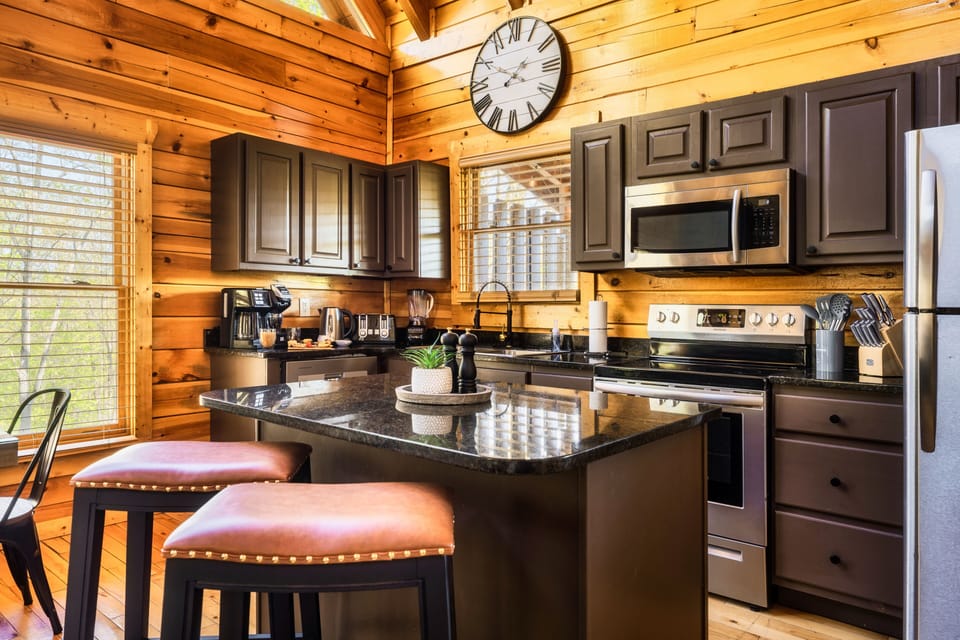 Our kitchen is fully equipped with a great appliances and kitchen island.