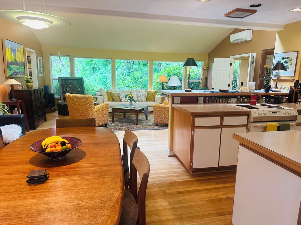 Open floor with high ceilings and lots of natural light.