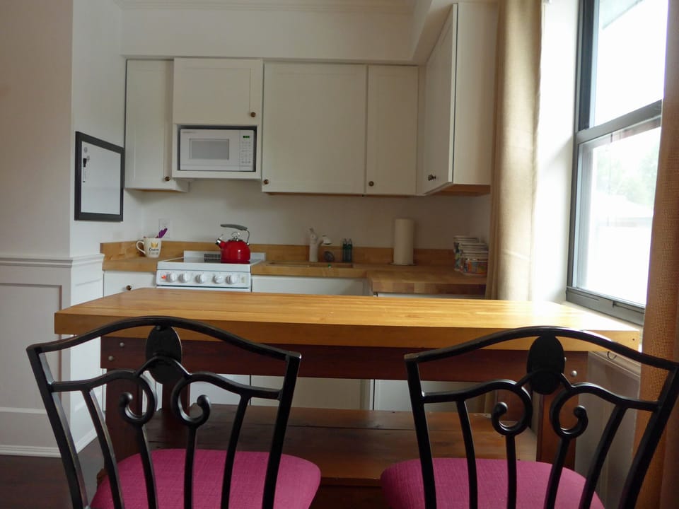 Kitchen with mini stove and microwave