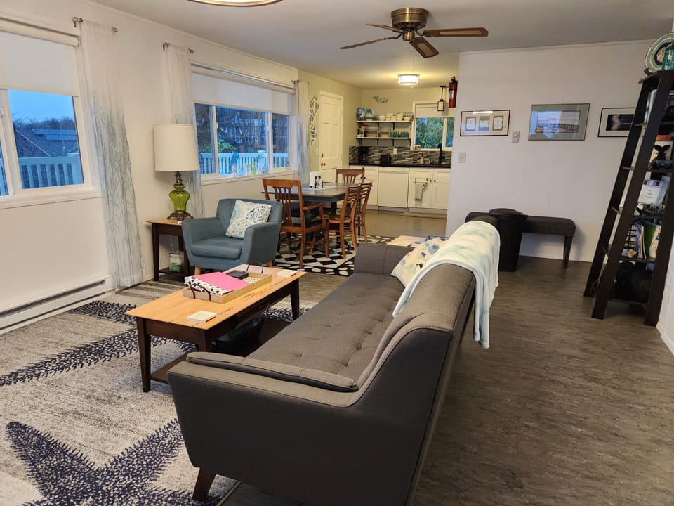 Open floor plan of living, dining, kitchen maximizes the view