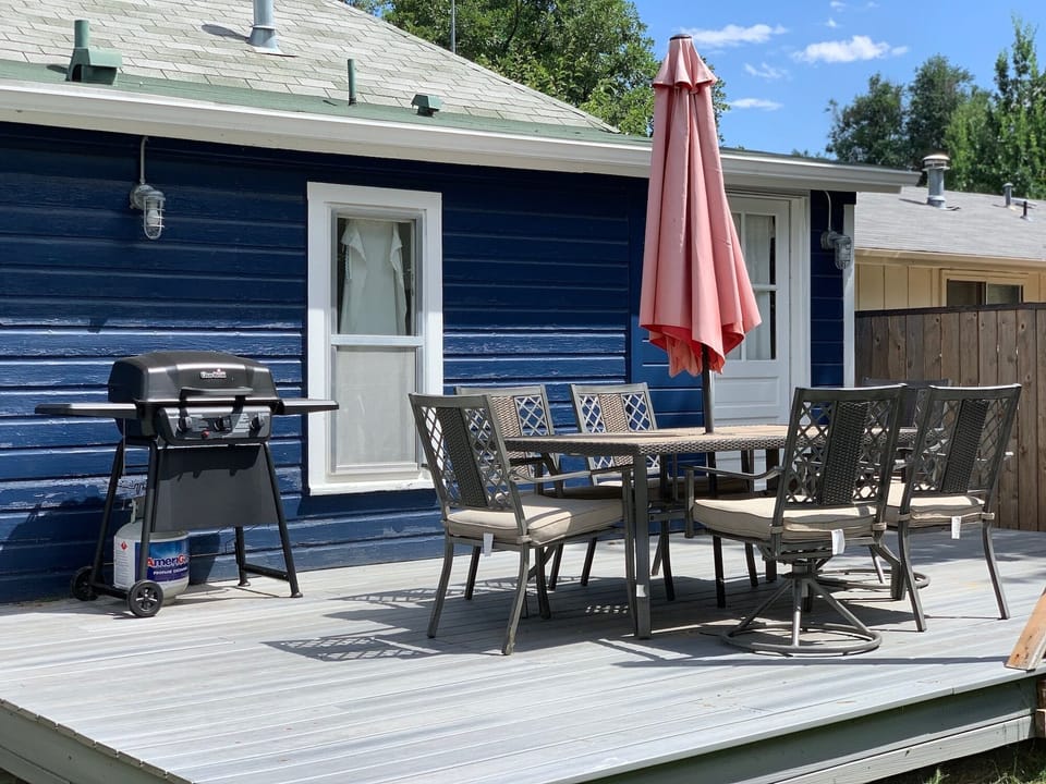 Back Patio with Outdoor Seating and BBQ Grill