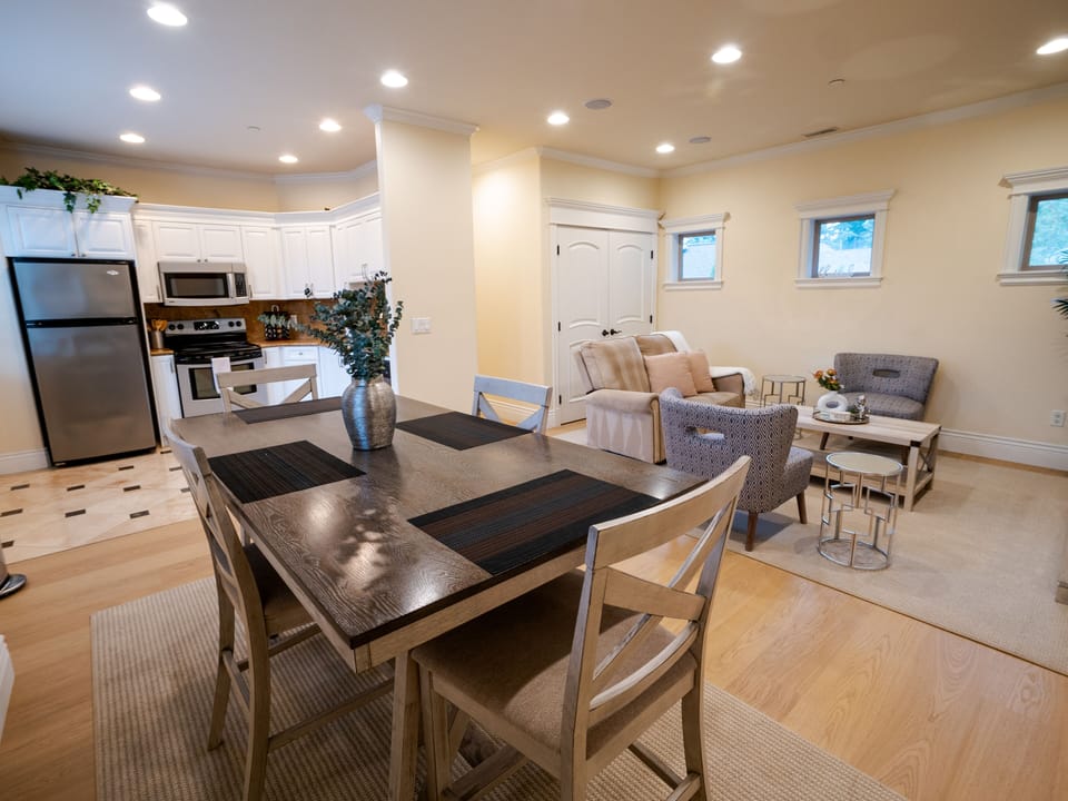 View from dining area looking towards living area and kitchen. Easy navigation!