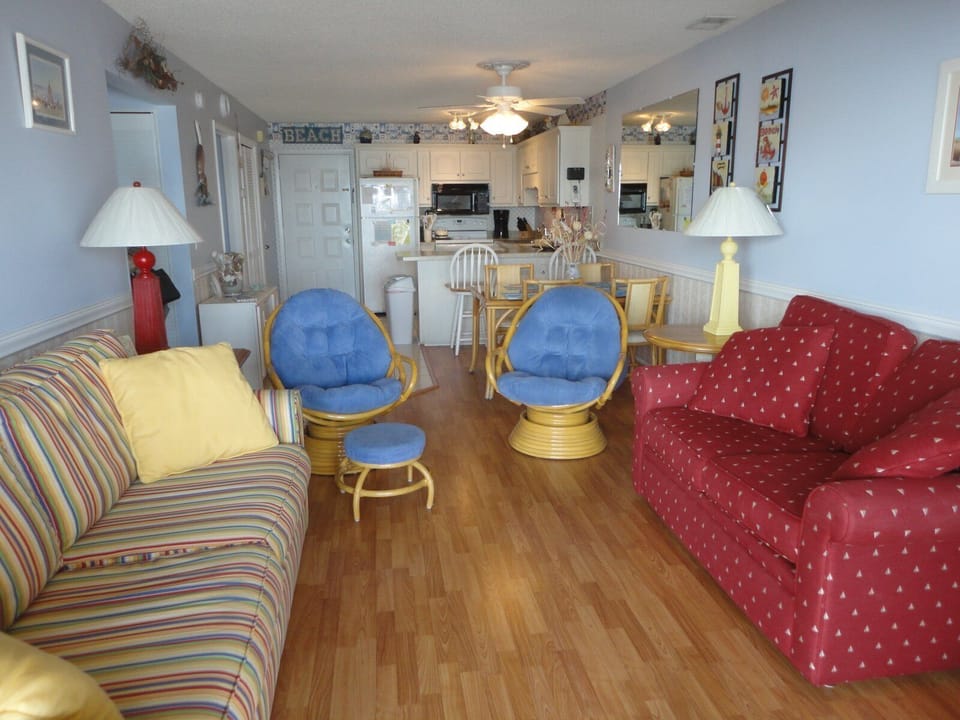 Looking at Living Room to Kitchen from balcony sliding door