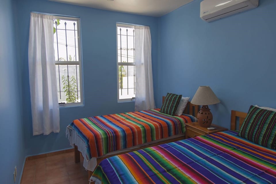 The 2nd bedroom has build in closet and drawers