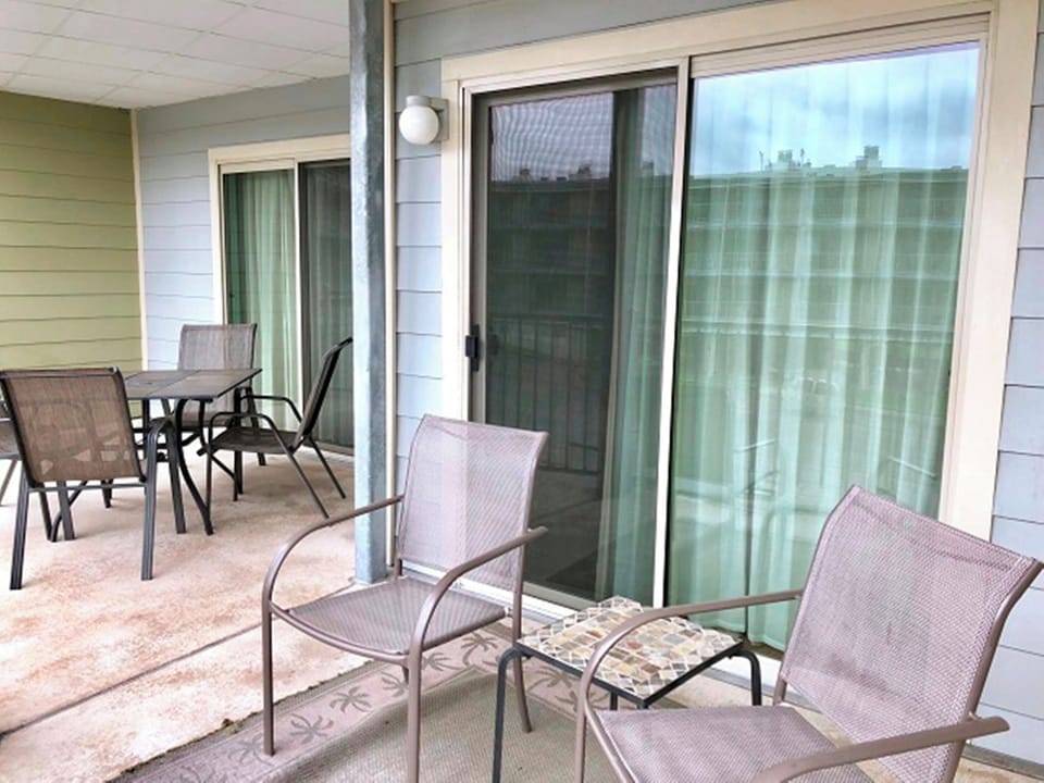 Double balcony with access from primary bedroom and living area.