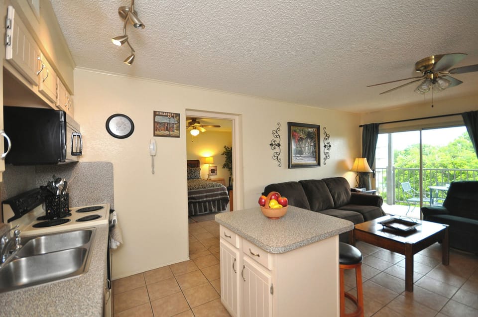Living area - shows primary bedroom.