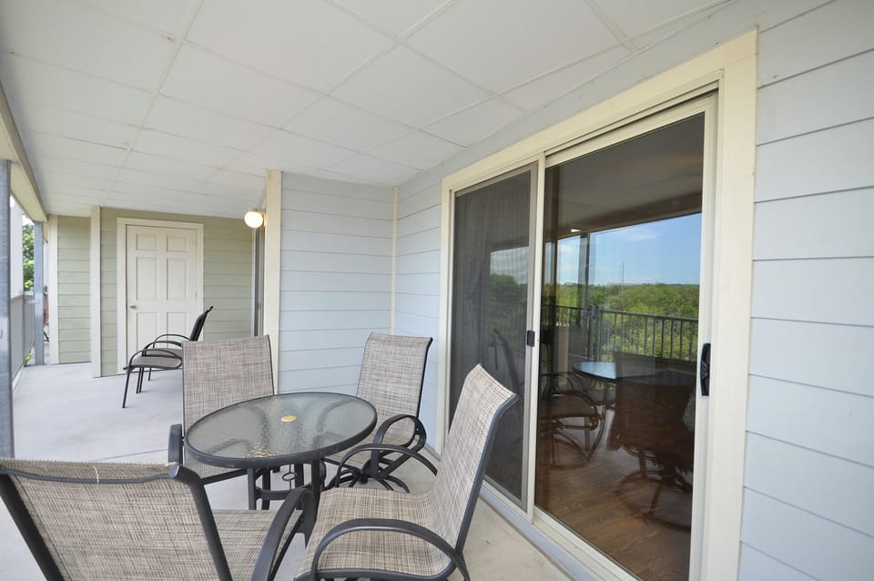 Double balcony can be accessed from primary bedroom or the living area.