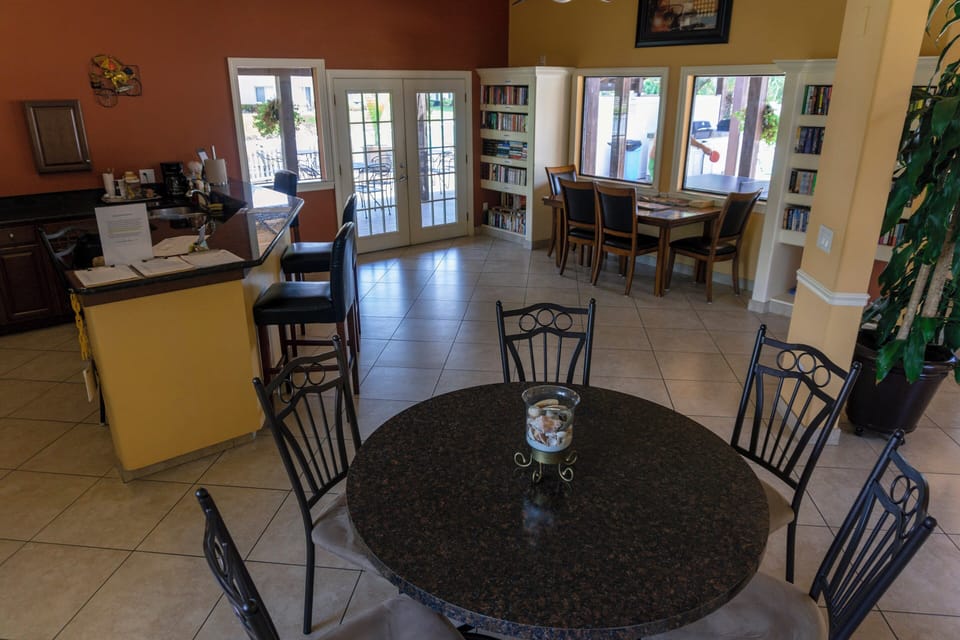 Share meals together in a bright, welcoming dining space.