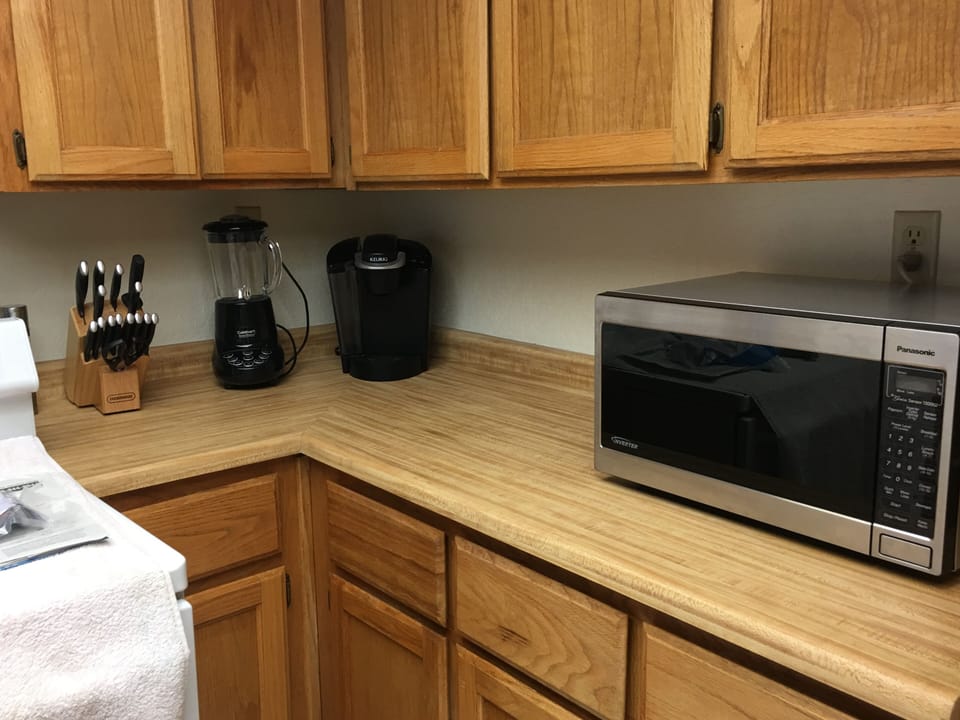 Kitchen has quality appliances . New stove and dishwasher