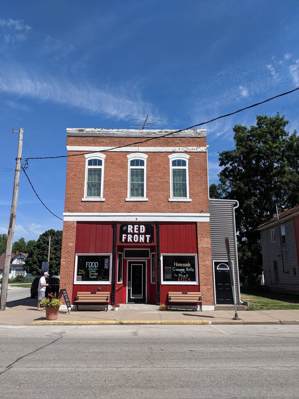 Front of the building. The apartment occupies the entire second floor. 