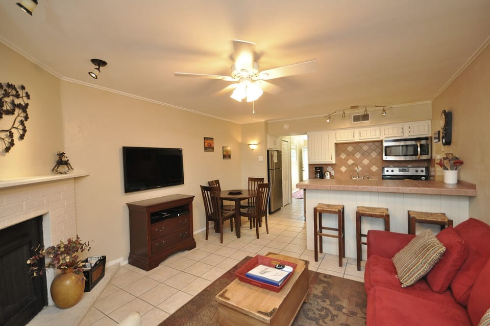 Watch TV from Living area or kitchen.