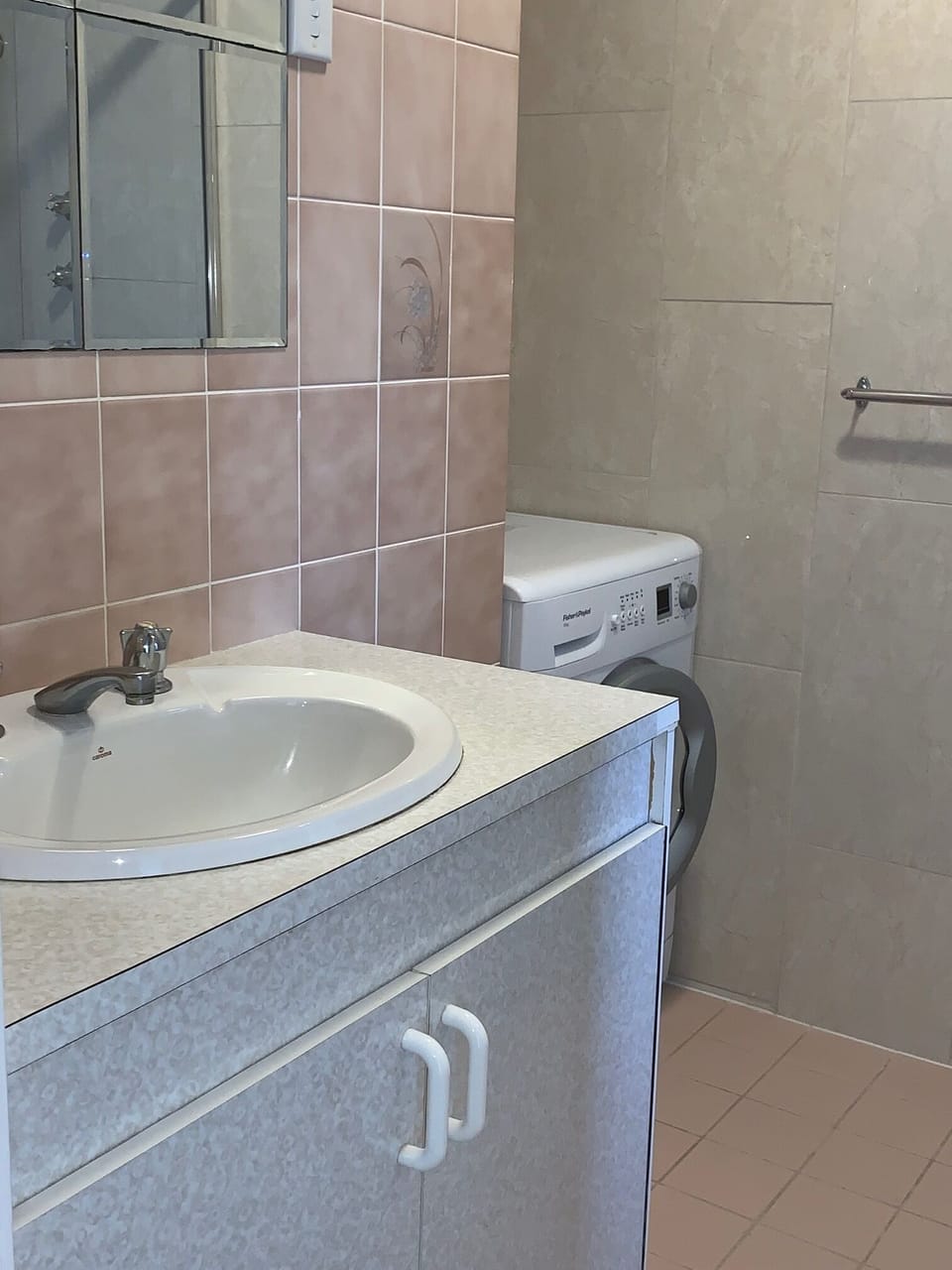 Bathroom with washing machine & shower