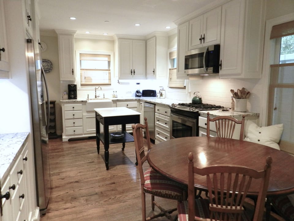 New white kitchen with granite counters has everything you need to make a meal!