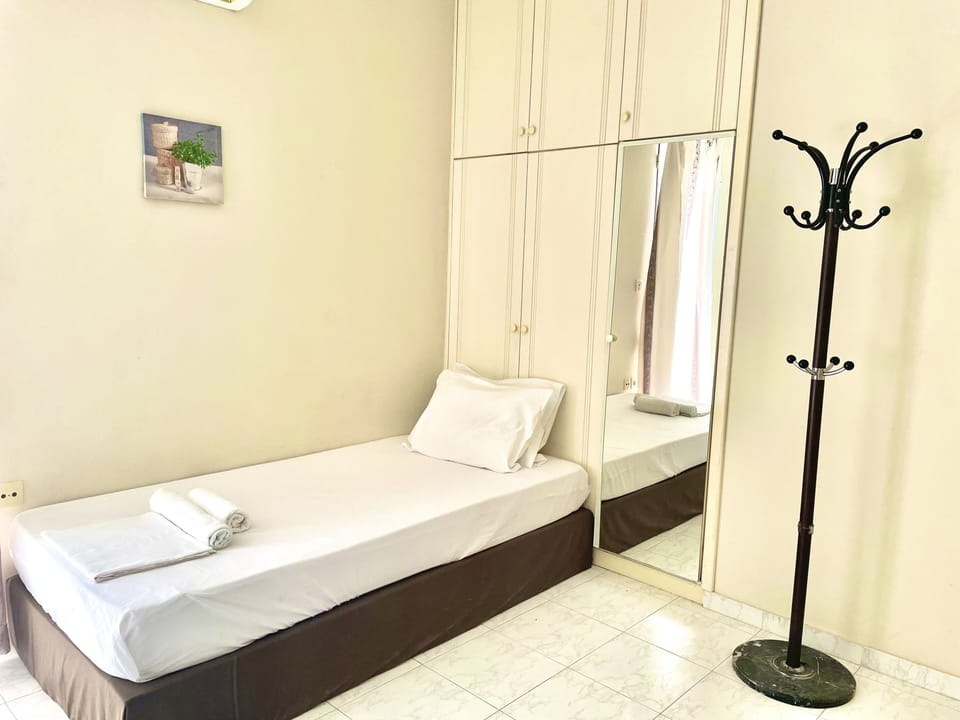 Single bed in kitchen living room 2