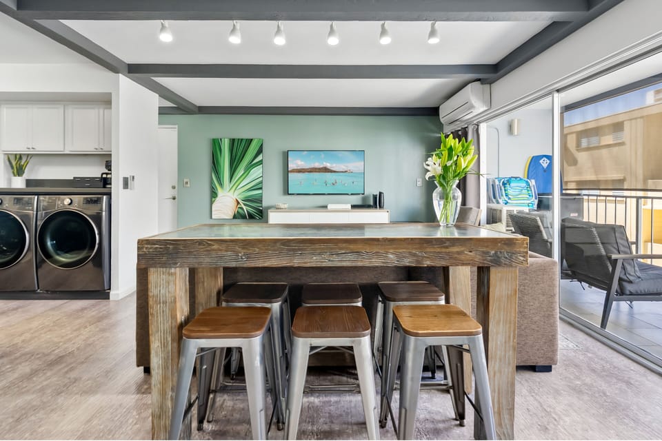 Industrial dining table with seating for six, perfect for shared meals.
