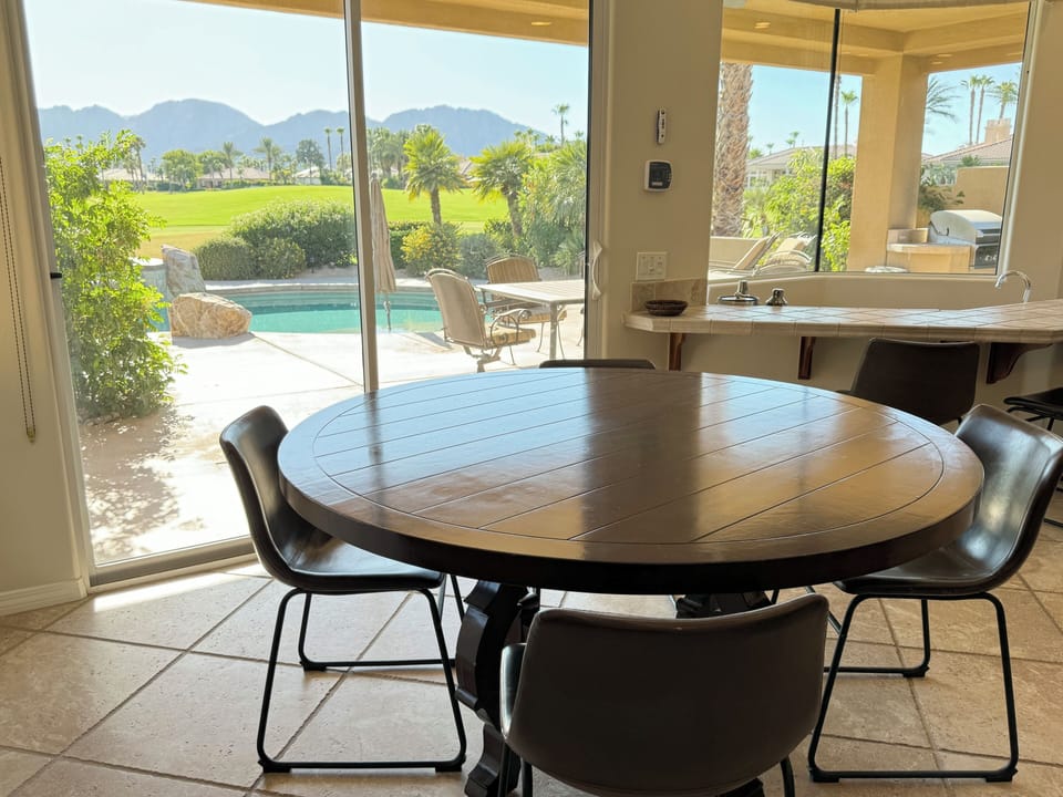 Dining table seats 6.  Another round table seats 4.  Lots of chairs.