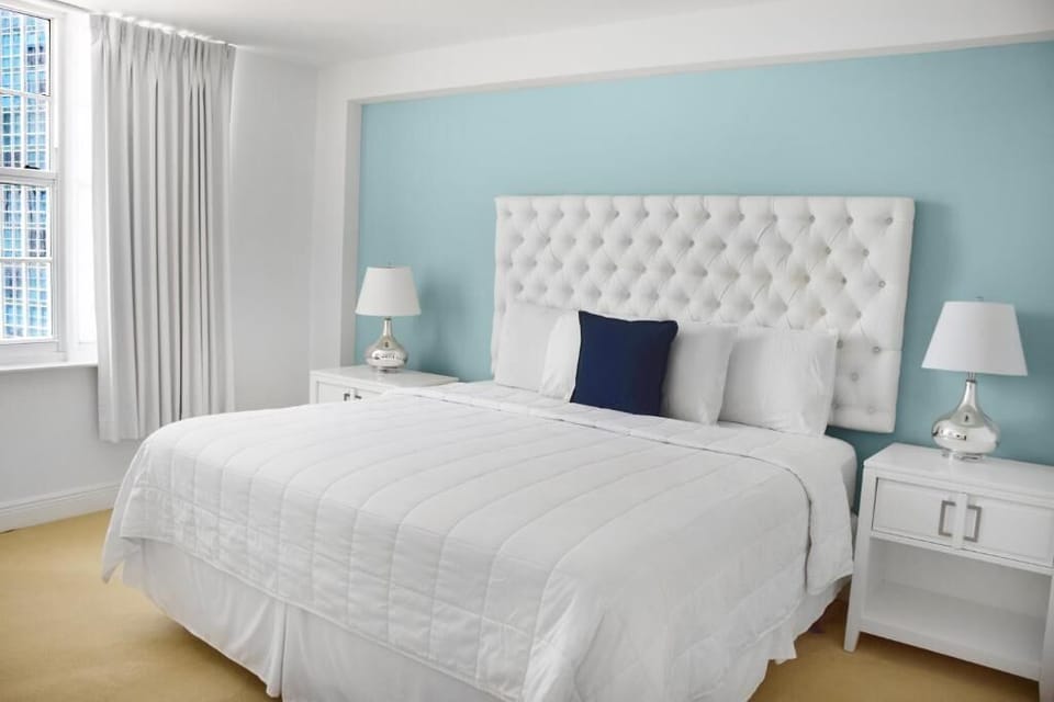 Wake up refreshed in a sunlit king suite with luxe linens.