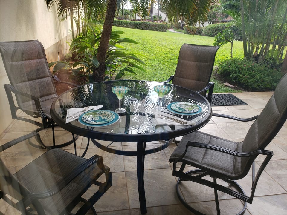Private lanai off of living room. All New patio furniture Aug 2019