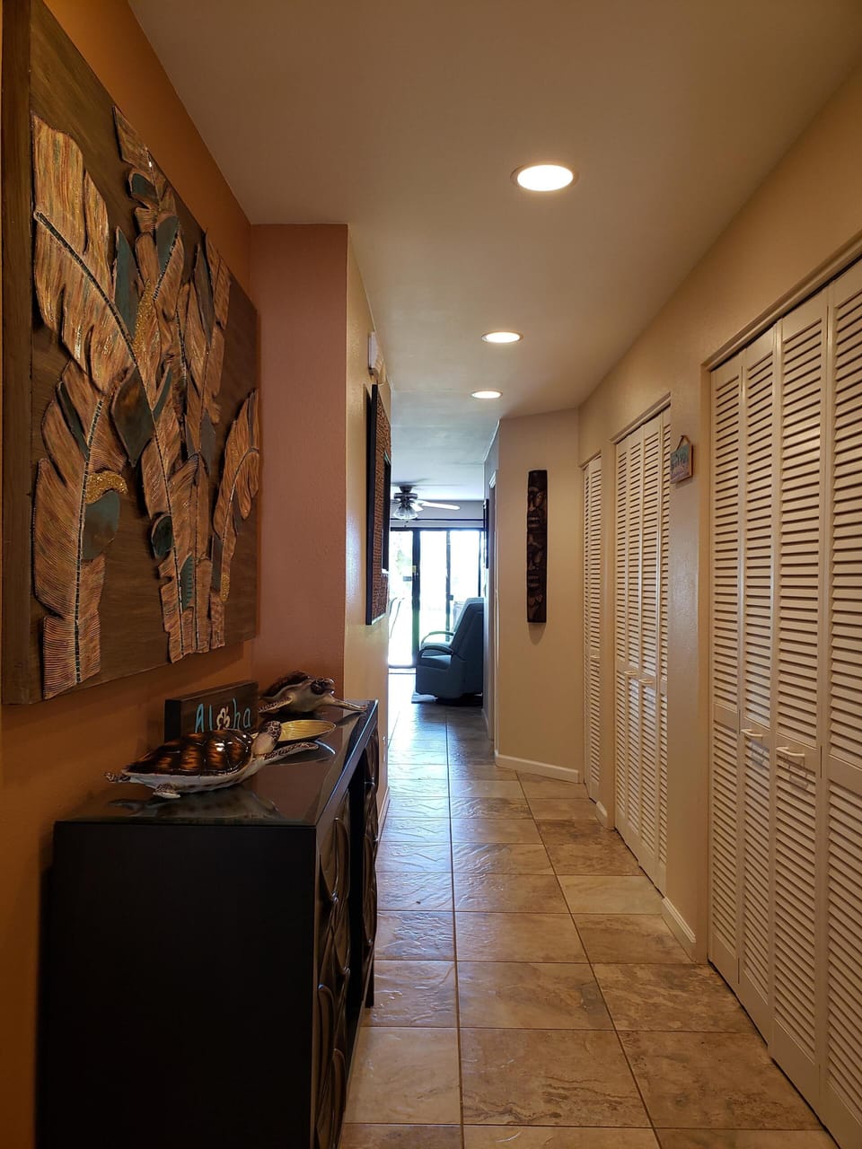 Hallway leading into kitchen and living/dining room