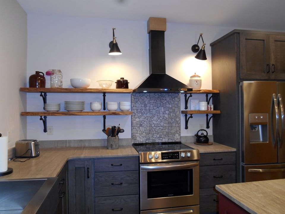 fully stocked  with glass top electric range and full size fridge