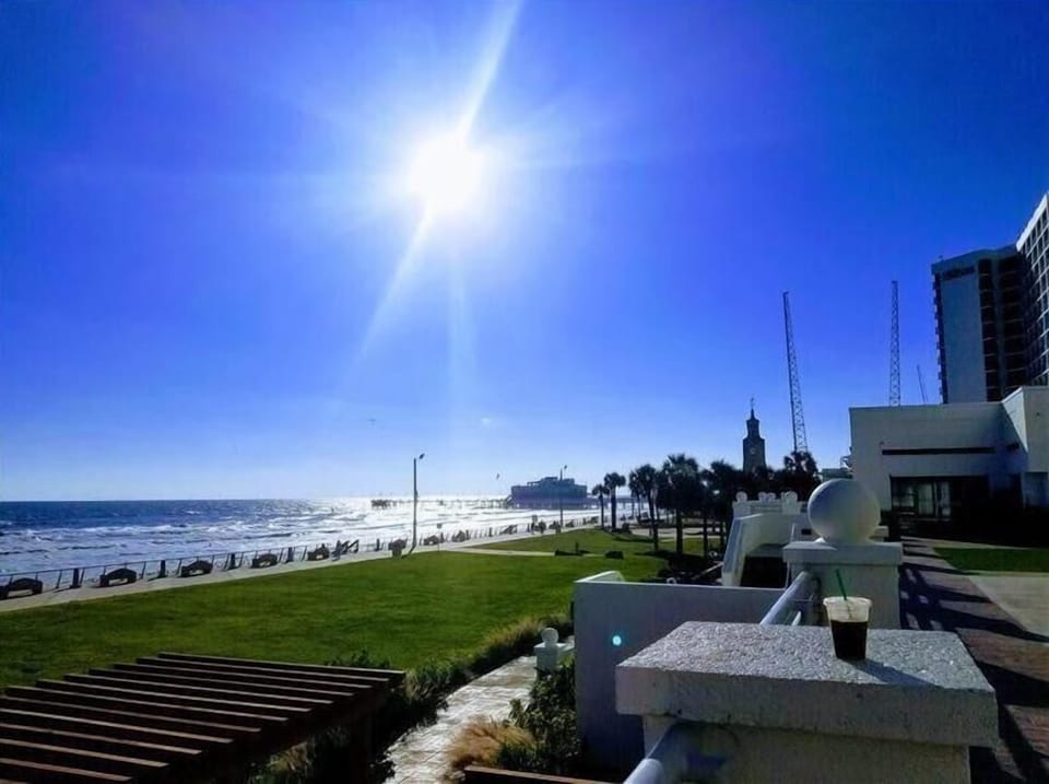 Step outside and feel the sun over oceanfront lawns.