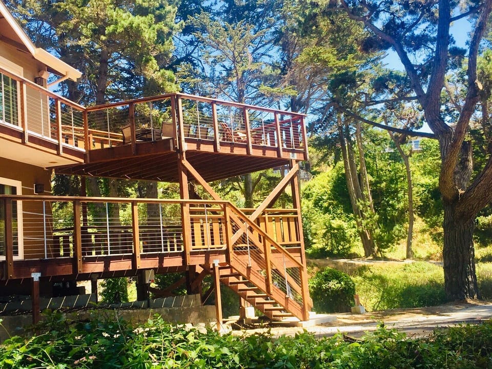 Secluded 2-level deck with beach view is perfect for outdoor entertaining
