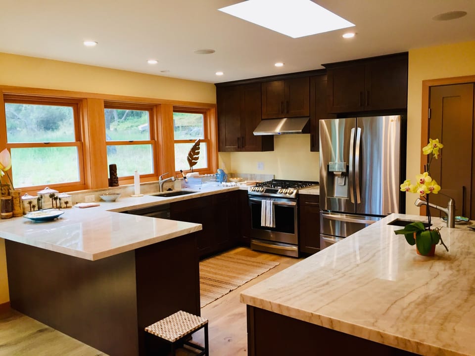 Newly remodeled kitchen with quartz countertops & LG stainless steel appliances