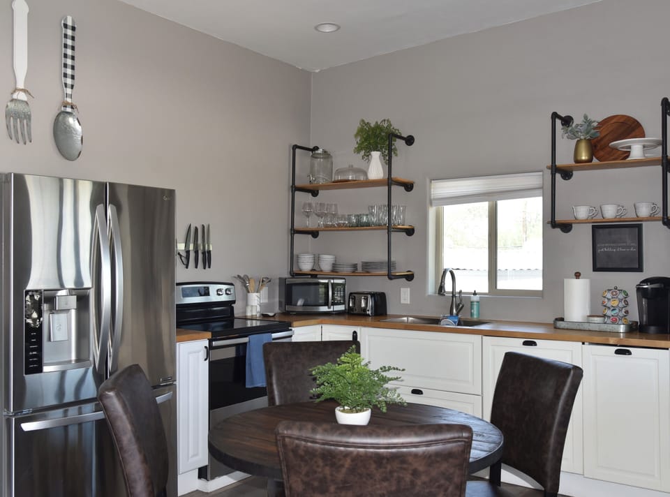 Full kitchen. Refrigerator, electric stove & dishwasher