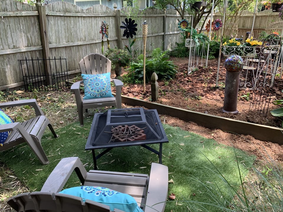 fire pit area with tiki torches....smores anyone?