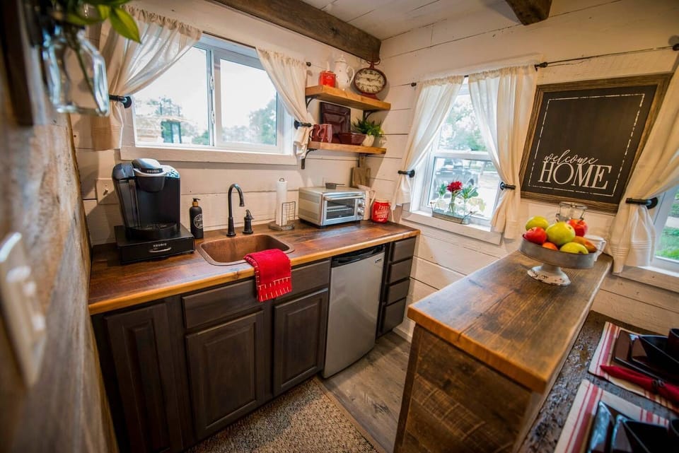 Cute kitchen has everything you need.