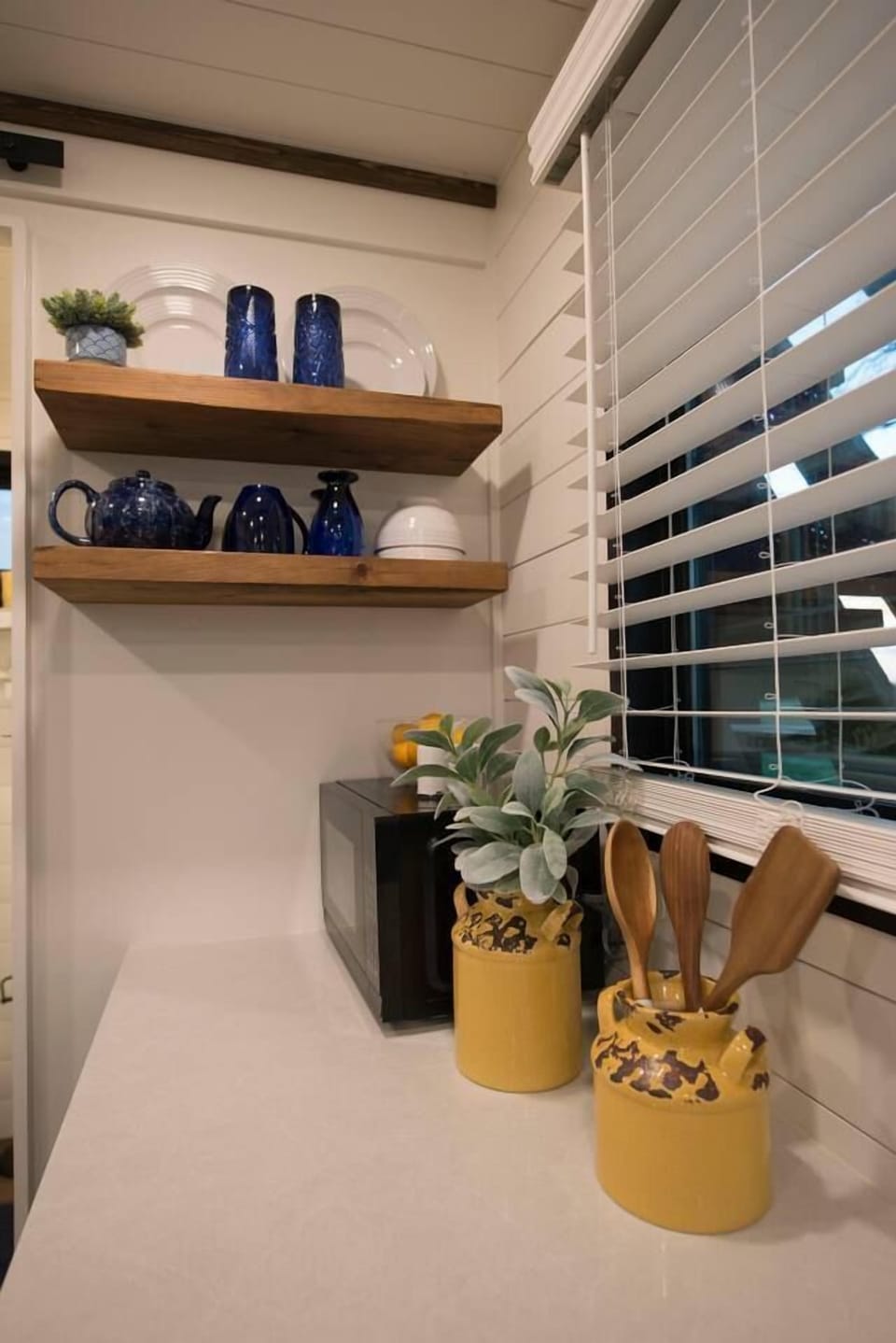 Decor is yellows and blues throughout.