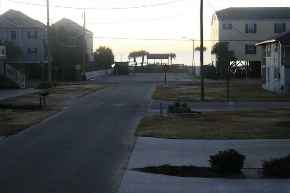 Public beach access 1 block away with bathrooms and extra public paid parking.