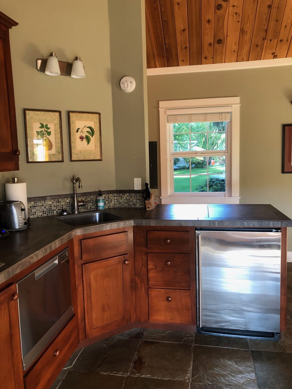 Kitchen with mini fridge, dishwasher, stovetop & combo convection oven/microwave
