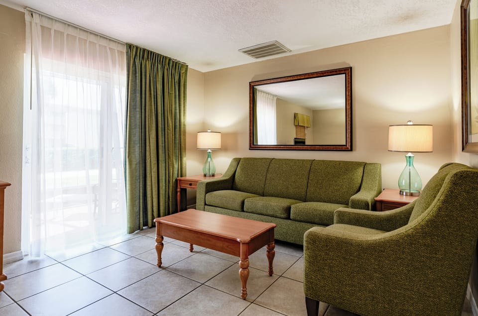 Living area. Exact unit will be assigned upon arrival. Views, colors, and decor may vary.