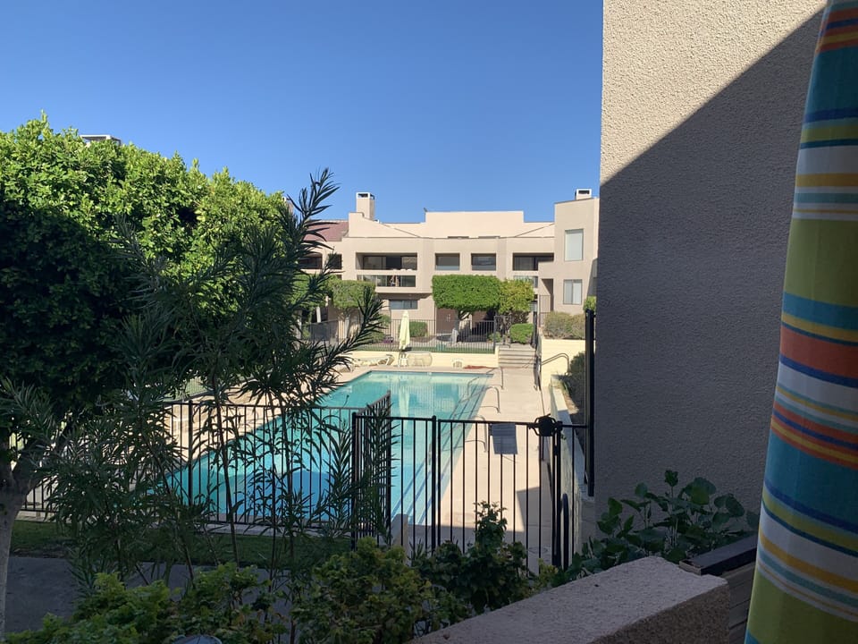 Pool out back gate of condo. One of 8 pools in the community.