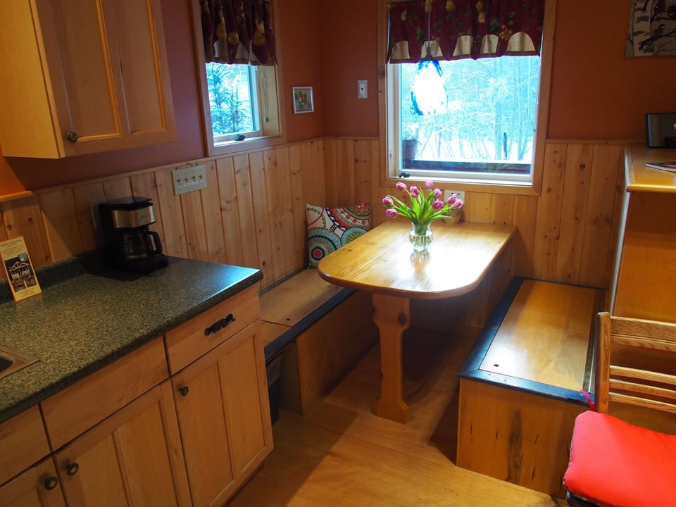 Another view of the kitchenette and breakfast nook